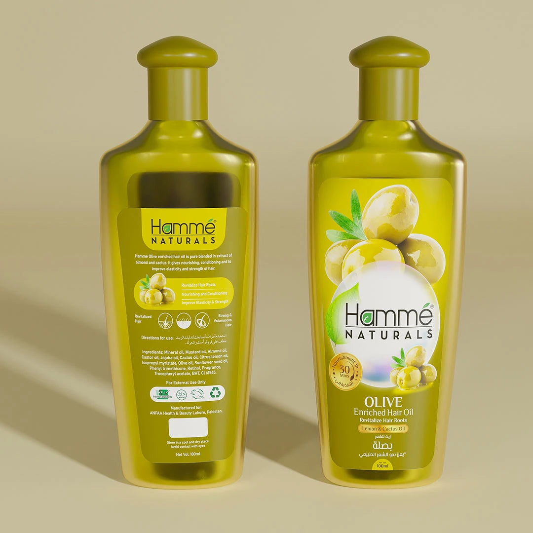 Olive Enriched Hair Oil - Hammé - Makes You Stand out - A bottle of coconut oil beside a coconut, highlighting its natural benefits for nourishing hair health