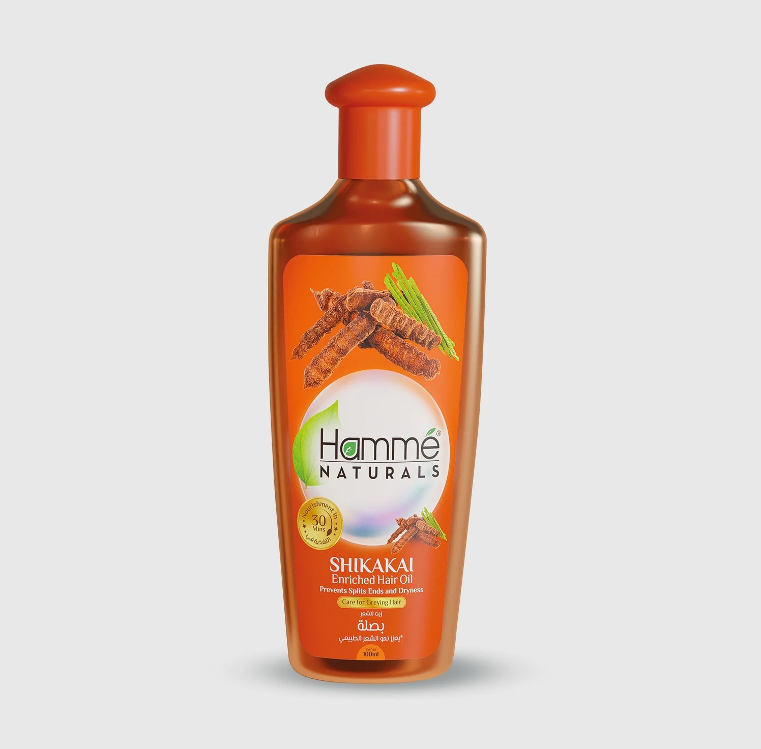 Shikakai Enriched Hair Oil - Hammé - Makes You Stand out - A bottle of Shikakai Oil by Hamme Naturals, featuring orange and cinnamon, enriched with natural hair care ingredients