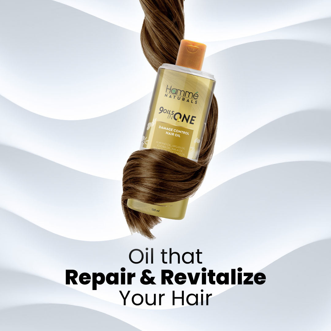 9 Oils in 1 Hair Oil - Hammé - Makes You Stand out  - A bottle of miracle hair oil surrounded by lush green leaves, symbolizing nourishment and vitality for healthy hair