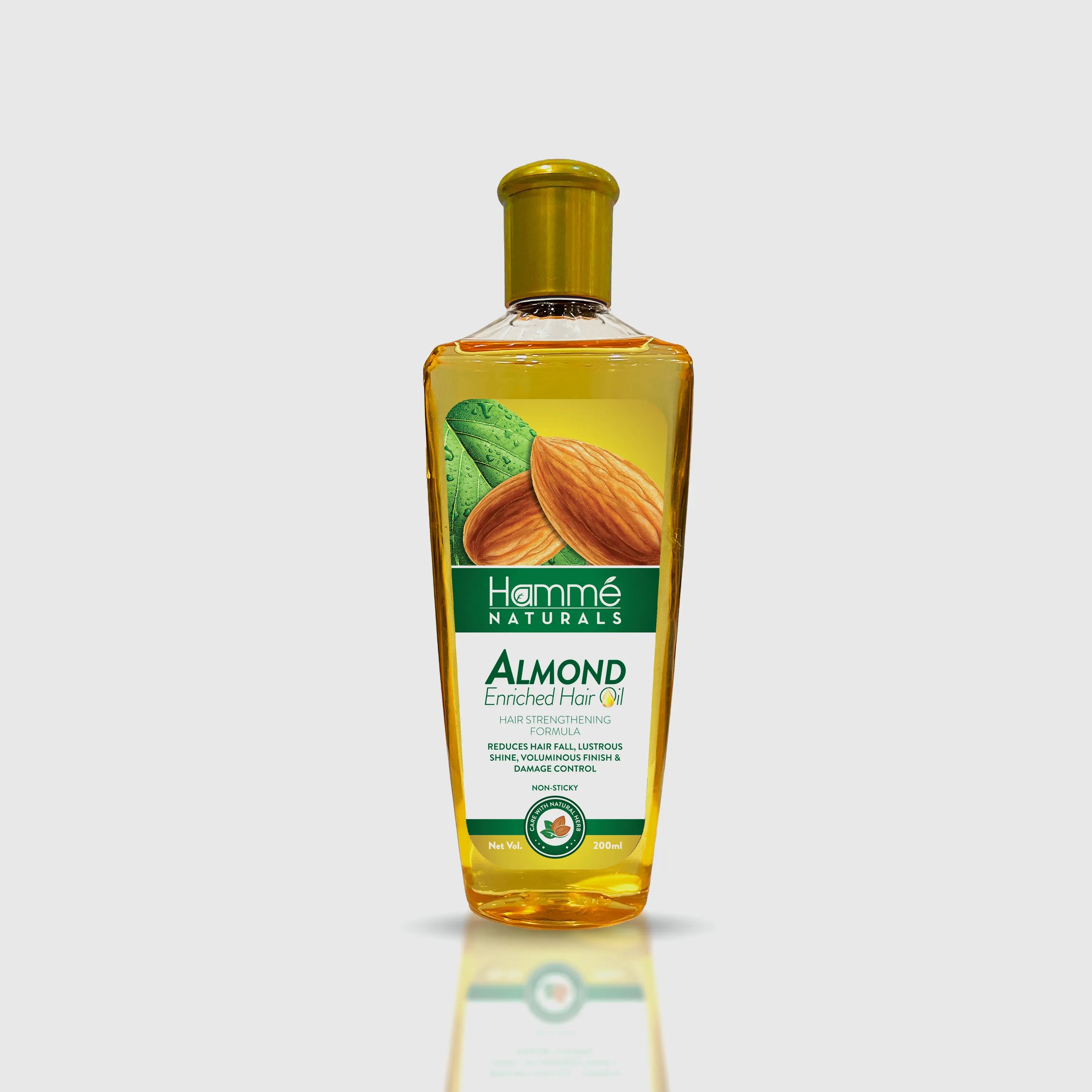 Almond Enriched Hair Oil - Hammé - Makes You Stand out  - Almond oil displayed with scattered almonds, emphasizing its nourishing properties for healthy hair