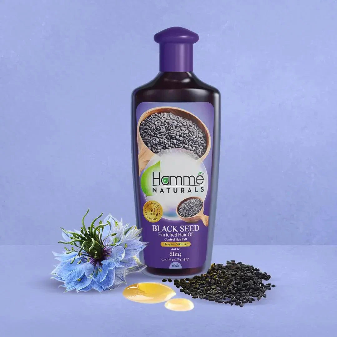 Black Seed Enriched Hair Oil - Hammé - Makes You Stand out  - A bottle of Hamme Naturals black seed enriched hair oil, highlighting its benefits for revitalizing and strengthening hair