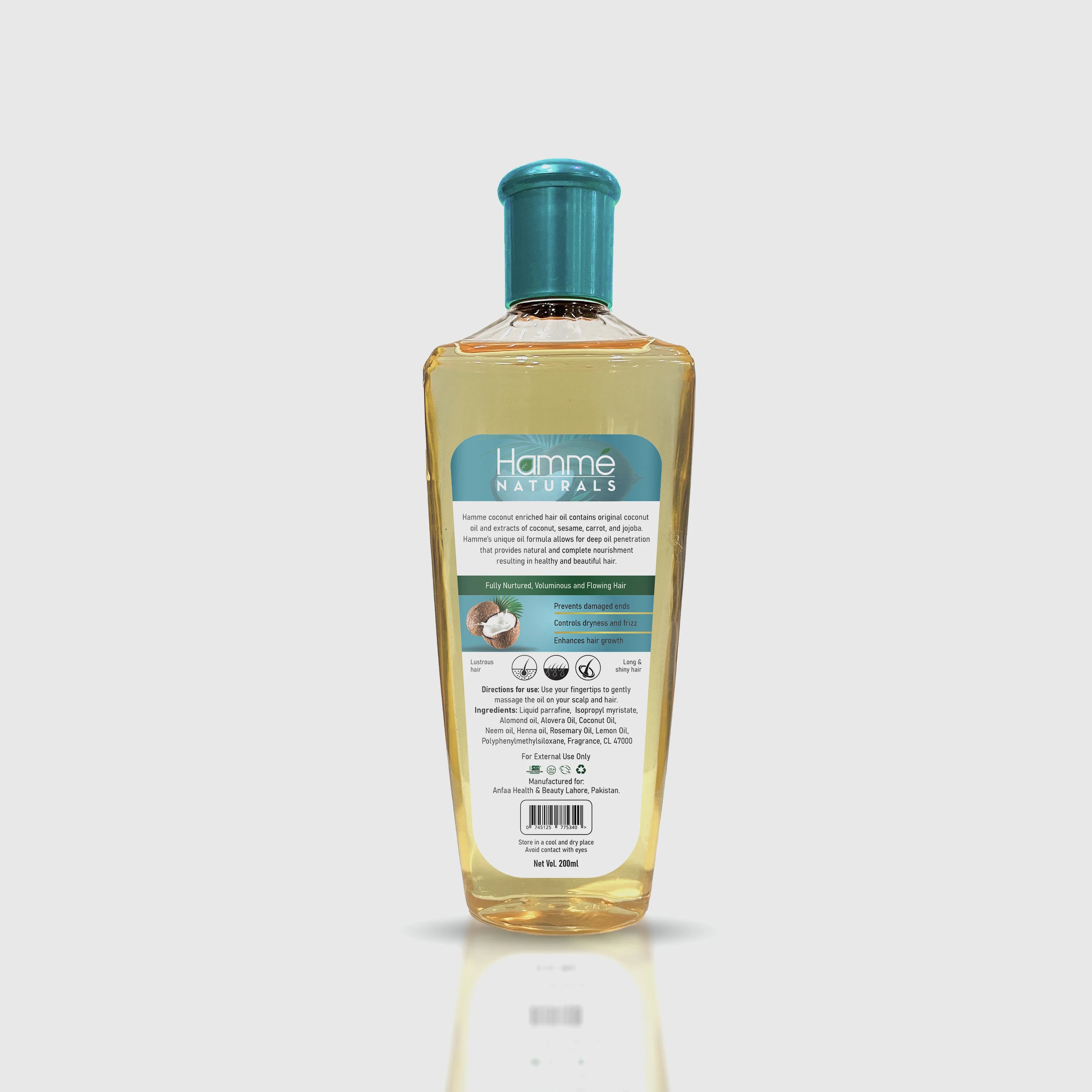 Coconut Enriched Hair Oil - Hammé - Makes You Stand out  - A bottle of coconut oil beside a coconut, highlighting its natural benefits for nourishing hair health