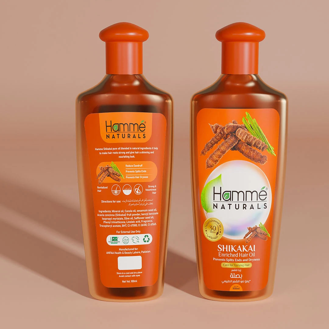 Shikakai Enriched Hair Oil - Hammé - Makes You Stand out  - A bottle of Shikakai Oil by Hamme Naturals, featuring orange and cinnamon, enriched with natural hair care ingredients